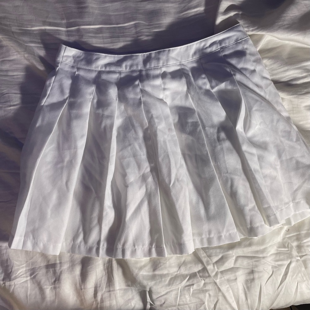 White pleated skirt